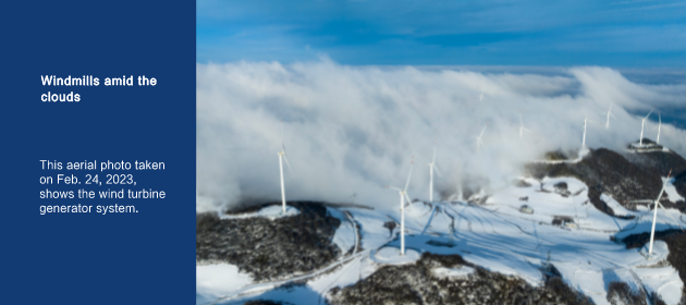 Windmills amid the clouds
